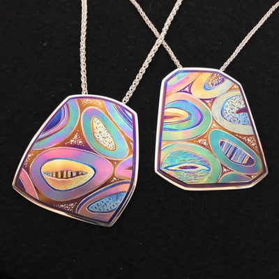 Titanium pendants