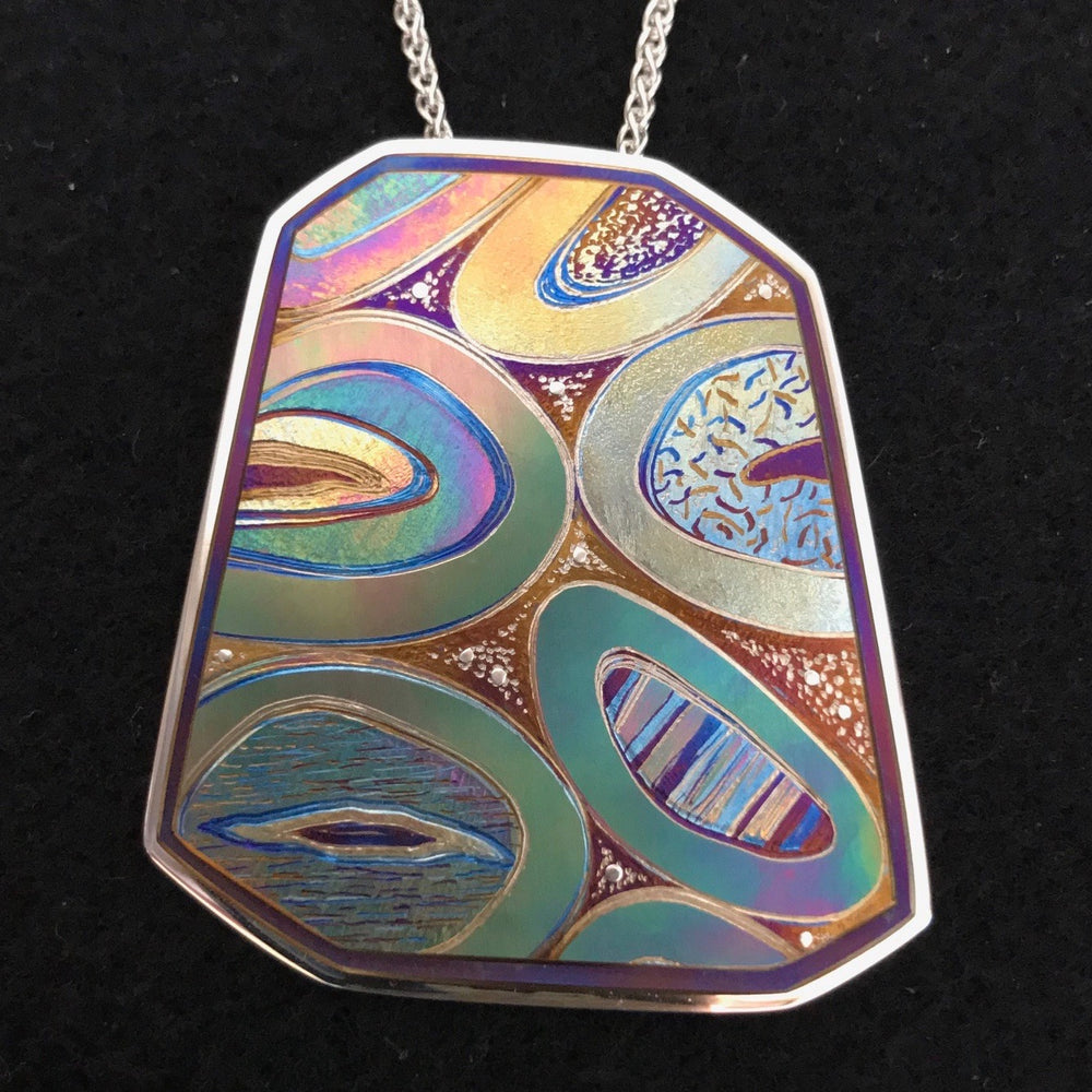 Titanium pendant