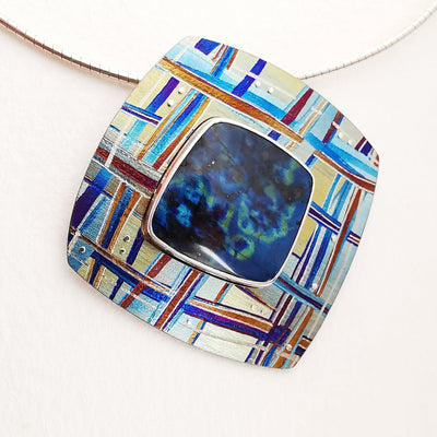 Titanium and spectrolite pendant  £285