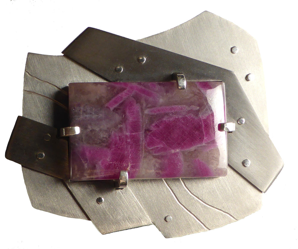 titanium brooch with ruby-in-matrix