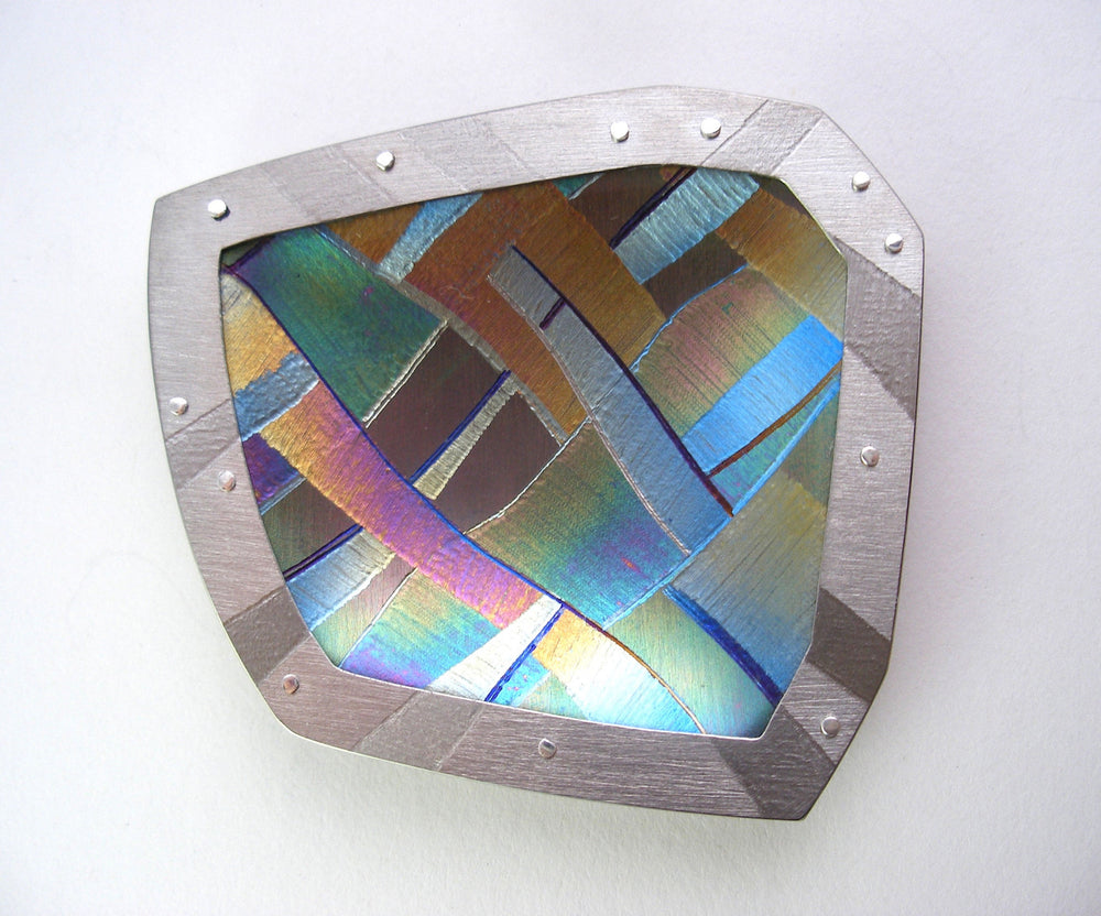 titanium 'finn-landscape' brooch