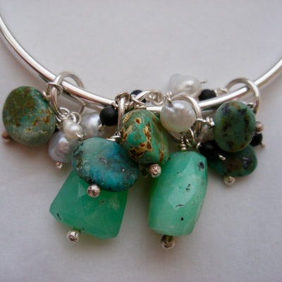 Silver bangle with stones