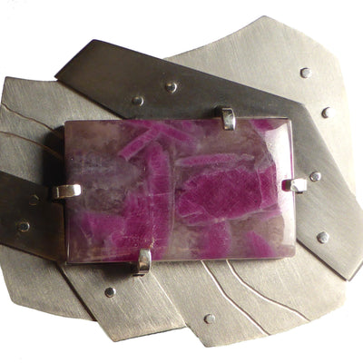 titanium brooch with ruby-in-matrix